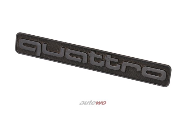 857853681A Audi 80/90/Coupe/Urquattro Typ 85/B2 quattro Emblem Armaturenbrett